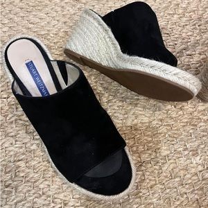 Stuart Weitzman suede open toe black wedges
Size 6 1/2
Excellent condition